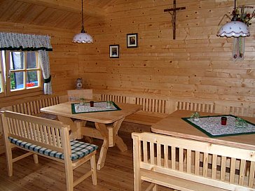 Ferienwohnung in Mondsee - Das Gartenhaus ist gemütlich mit Kaminofen