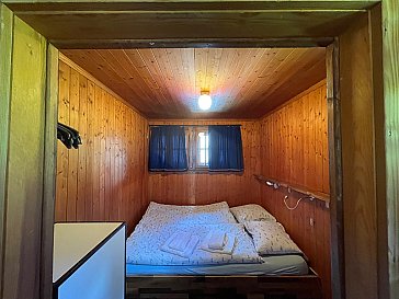 Ferienwohnung in Kandersteg - Schlafzimmer 3 mit Bett 140/200