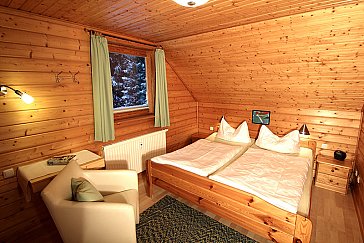 Ferienhaus in Hasselfelde - Schlafzimmer mit Kinderbett