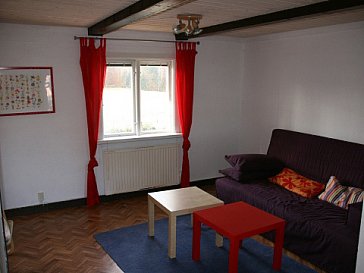 Ferienhaus in Västra Torup - Wohnzimmer mit 2 Notbetten