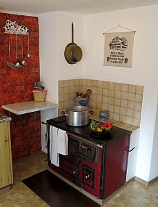 Ferienhaus in Conters - Kochen auf dem Holzkochherd