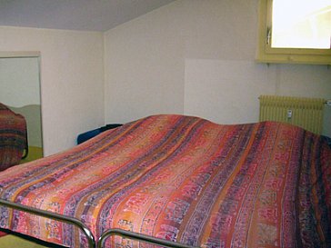 Ferienwohnung in Saanen - Schlafzimmer