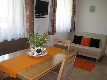 Ferienwohnung in Alpbach - Heller Wohnraum mit ausziehbarer Couch