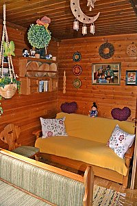 Ferienhaus in Wagrain - Sofa in der Hüttenstube