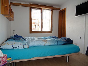 Ferienwohnung in Laax - Schlafzimmer
