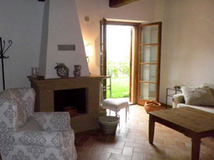 Ferienwohnung in Castelmuzio - Wohnzimmer mit Kamin
