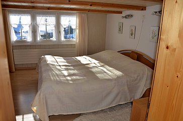 Ferienwohnung in Brunnadern - Schlafzimmer
