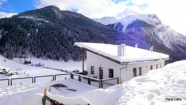 Ferienwohnung in Graun - Haus Larix im Schnee
