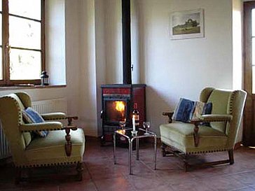 Ferienhaus in Montieri - Der Kaminofen mit Sitzecke