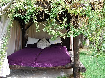Ferienwohnung in Guía de Isora - Garten Bett