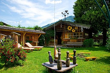 Ferienwohnung in Rauris - Liegewiese und Grillhaus