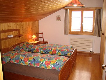 Ferienwohnung in Vals - Elternschlafzimmer