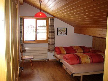 Ferienwohnung in Vals - Kinderschlafzimmer
