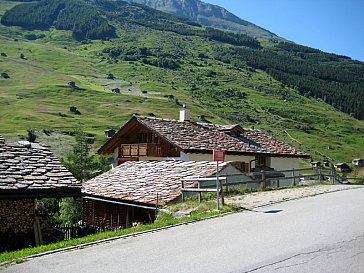 Ferienwohnung in Vals - Dachwohnung mit Holzlager