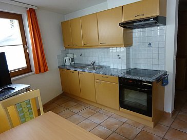 Ferienwohnung in Samnaun-Compatsch - Wohnküche im EG