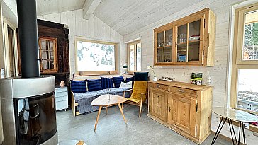 Ferienwohnung in Kandersteg - Wohn-Schlafzimmer 4 / Livingroom mit Kaminofen