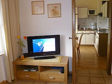 Ferienwohnung in Oberscheidweiler - Wohnzimmer Blick in die Küche