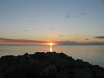 Ferienhaus in Makkum - Sonnenuntergang am IJsselmeer