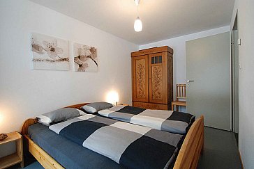 Ferienwohnung in Lenzerheide - Schlafzimmer