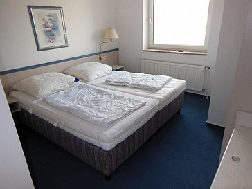 Ferienwohnung in Haffkrug - Doppelbett im Schlafzimmer
