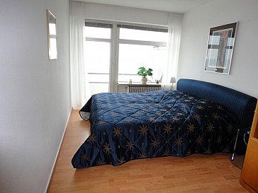 Ferienwohnung in Haffkrug - Schlafzimmer Wohnung 305 mit Balkon und Seeblick