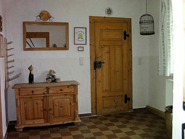 Ferienhaus in Kössern - Der Eingangsbereich Garderobe