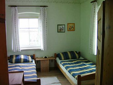 Ferienhaus in Kössern - Schlafzimmer Wiese