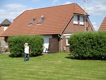 Ferienhaus in Friedrichskoog-Spitze - Terrassenseite eines Doppelhauses