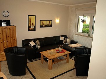 Ferienhaus in Dargun - Gemütliche Couch und Medienbereich