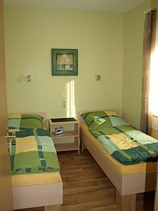 Ferienhaus in Dargun - Schlafzimmer mit 2 Einzelbetten