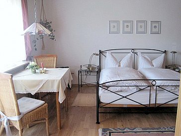 Ferienwohnung in Titisee-Neustadt - Schlafzimmer mit Zugang zur Terrasse