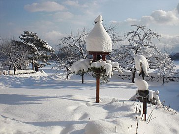 Ferienwohnung in Mondsee - Der Schnee hat unseren Garten verzaubert