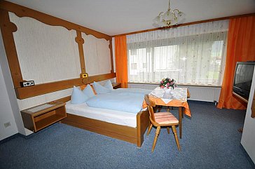 Ferienwohnung in Walchsee - Gemütliche Gästezimmer mit DU/WC/TV