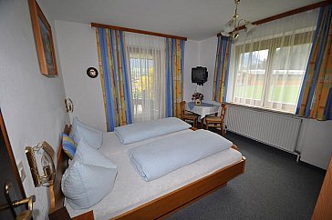 Ferienwohnung in Walchsee - Gemütliche Gästezimmer mit DU/WC/TV