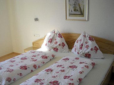 Ferienwohnung in Zell am See - Doppelbett im Schlafzimmer
