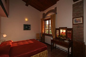 Ferienhaus in Peccioli - Schlafzimmer mit Doppelbett