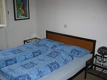 Ferienwohnung in Castellina Marittima - Das Schlafzimmer 1 mit einem Doppelbett und...