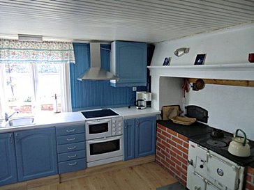 Ferienhaus in Fagerhult - Neue Küche mit altem Holzherd