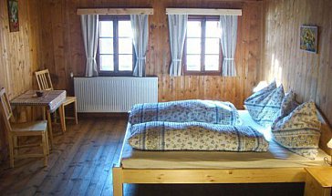 Ferienhaus in Ebene Reichenau - Eines der gemütlichen Doppelzimmer
