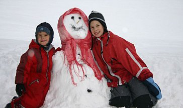 Ferienhaus in Ebene Reichenau - Winterzeit - Schneemannzeit