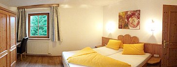 Ferienwohnung in Neustift im Stubaital - Alpenanemone und Alpenrose Schlafzimmer