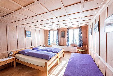 Ferienwohnung in Lungern - Schlafzimmer mit 3 Bett
