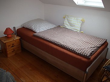 Ferienhaus in Friedrichstadt - Schlafzimmer OG 100 x 200 Bett