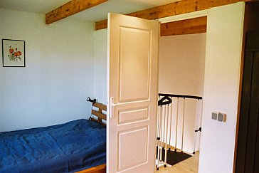 Ferienwohnung in Ver - Schlafzimmer mit Doppel- und Einzelbett