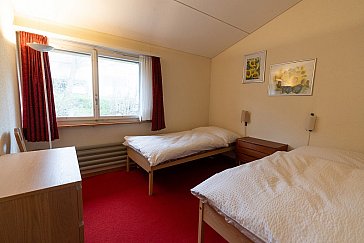 Ferienhaus in Fürstenaubruck - Schlafzimmer rot