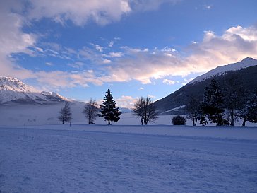 Ferienwohnung in Reschen - Abendstimmung an der Loipe