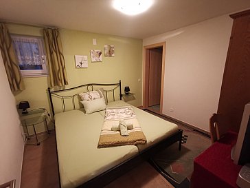 Ferienwohnung in Scuol - Grünes Doppelschlafzimmer