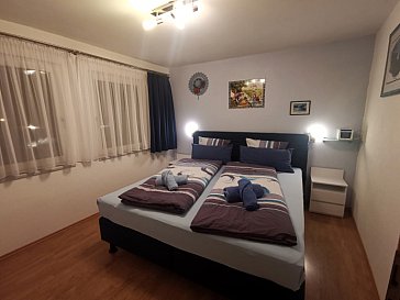 Ferienwohnung in Scuol - Blaues Doppelschlafzimmer