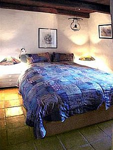 Ferienhaus in Avegno - Schlafzimmer mit französischem Doppelbett