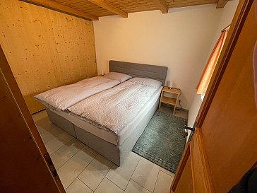 Ferienwohnung in Lenzerheide - Schlafzimmer